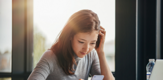 Girl uses a cell phone