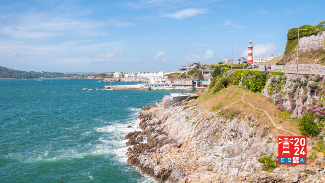Coastline in Plymouth with its iconic lighthouse.